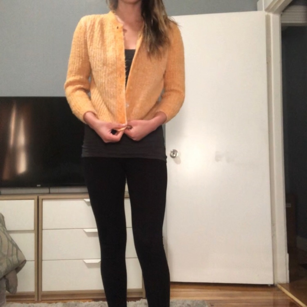 VINTAGE orange cream colored cardigan